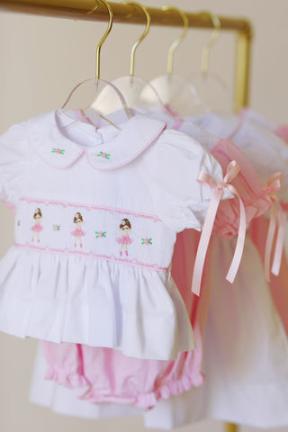 Shop the Baby Girl Collection at Little Harts for timeless, heirloom-quality outfits with delicate smocking, soft fabrics, and charming Southern style.