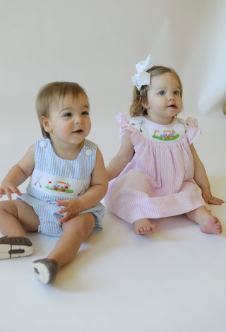 Shop the Baby Collection at Little Harts – featuring timeless, heirloom-quality outfits, soft fabrics, and charming designs for your little one's sweetest moments.