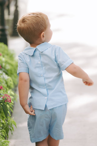 Little boy in light blue piped Peter Short Set with Peter Pan collar, perfect for Easter or special occasion dressing.